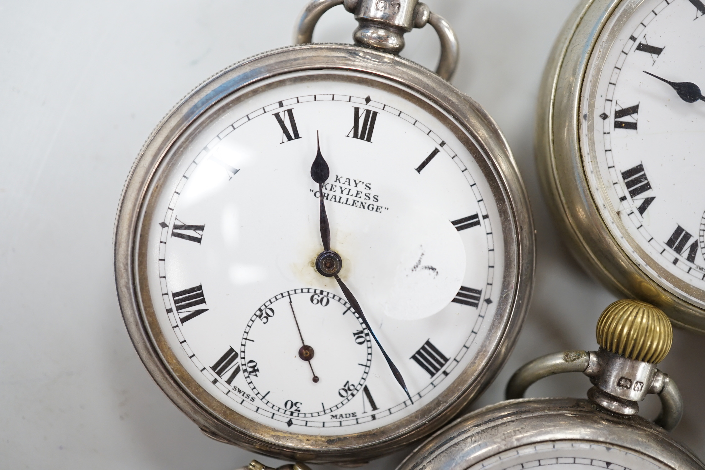 Thirteen assorted pocket and fob watches including silver Exchange and silver J.W. Benson.